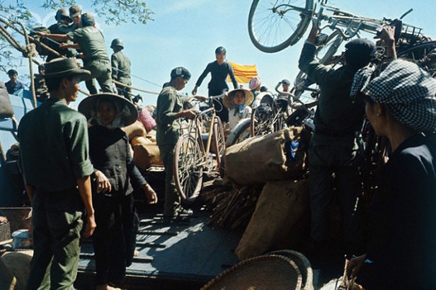 14 Jan 1967, Ben Suc, South Vietnam --- Vietnamese Refugees Getting Ready for Relocation --- Image by © Bettmann/CORBIS