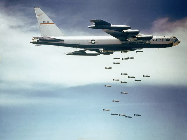 This image has an empty alt attribute; its file name is boeing_b-52_dropping_bombs.jpg